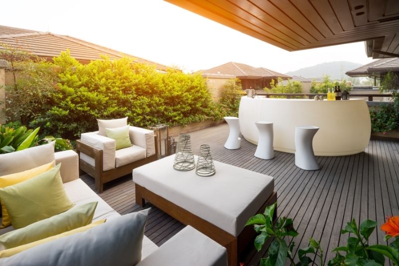 wide area patio having huge sofa and bar area